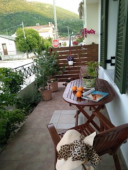 Private veranda with wood furniture